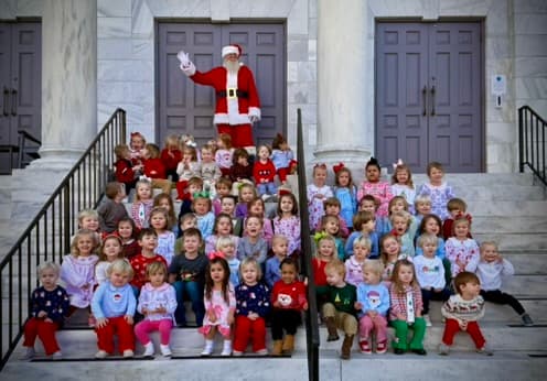 Preschool Christmas visit with Santa on the church steps